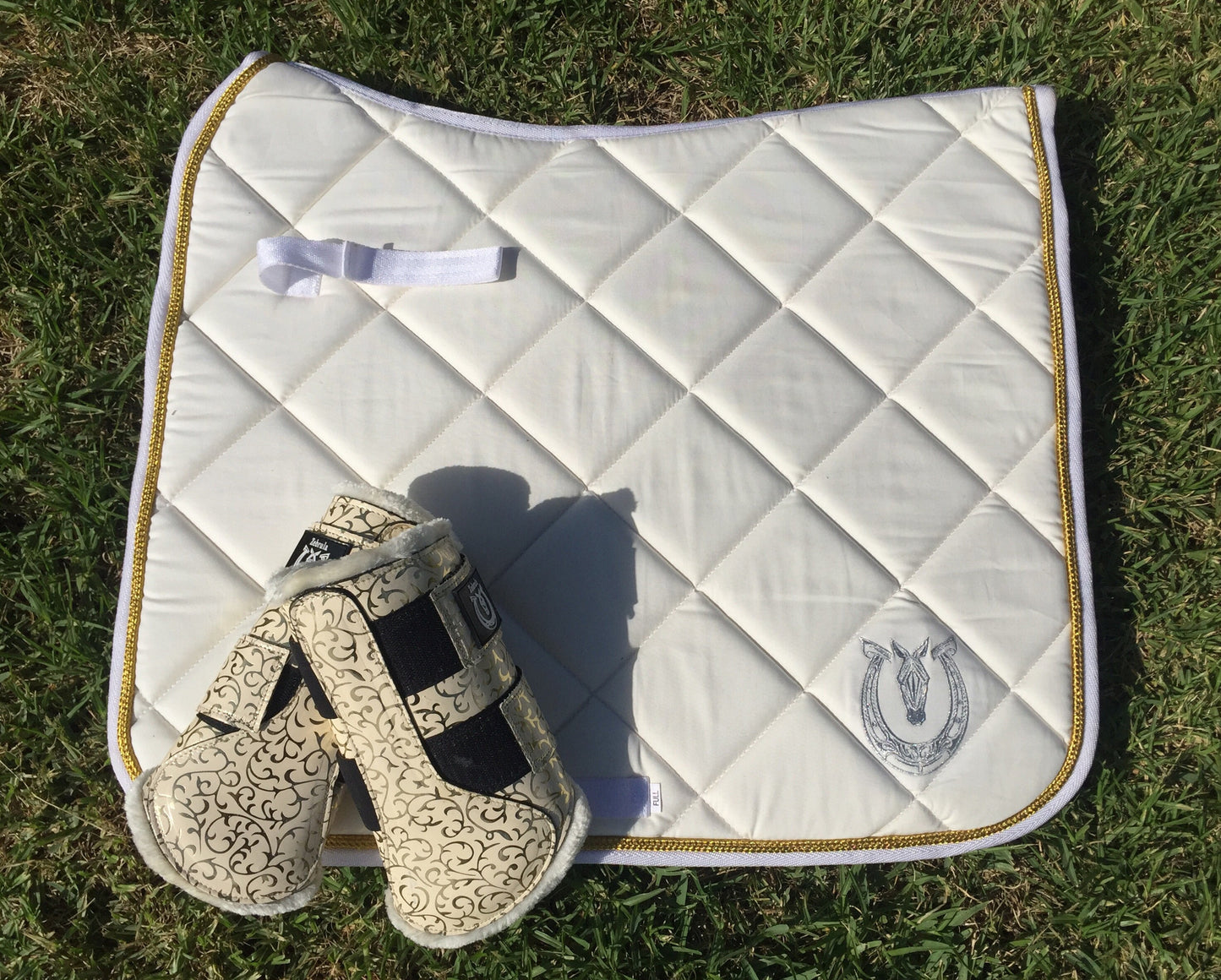 Cream and gold dressage pad