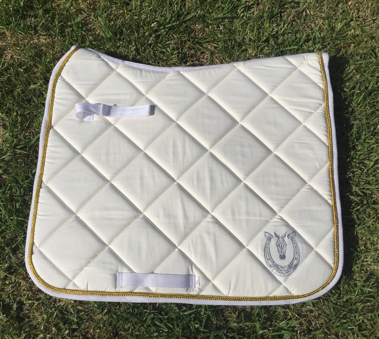 Cream and gold dressage pad