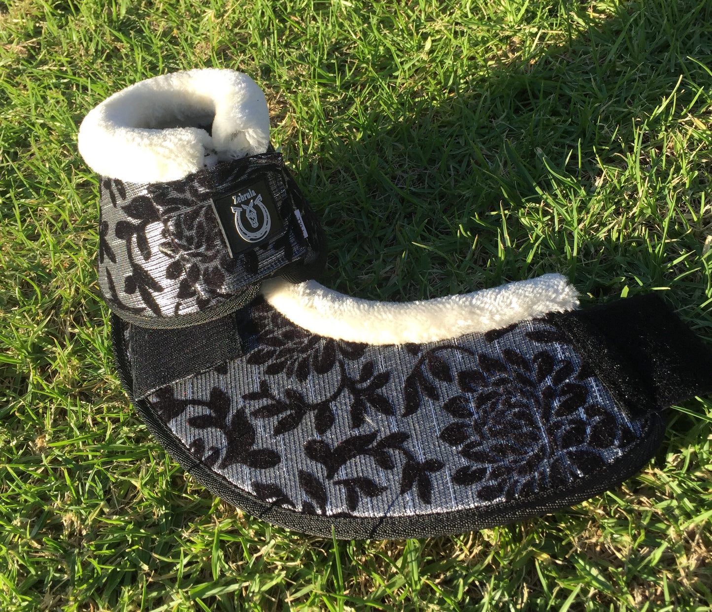 Black and silver bell boots