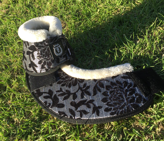 Black and silver bell boots