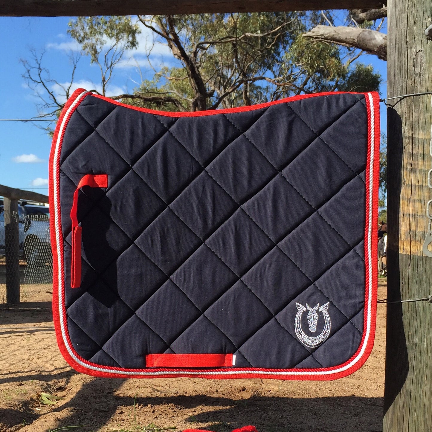 Navy and red dressage pad